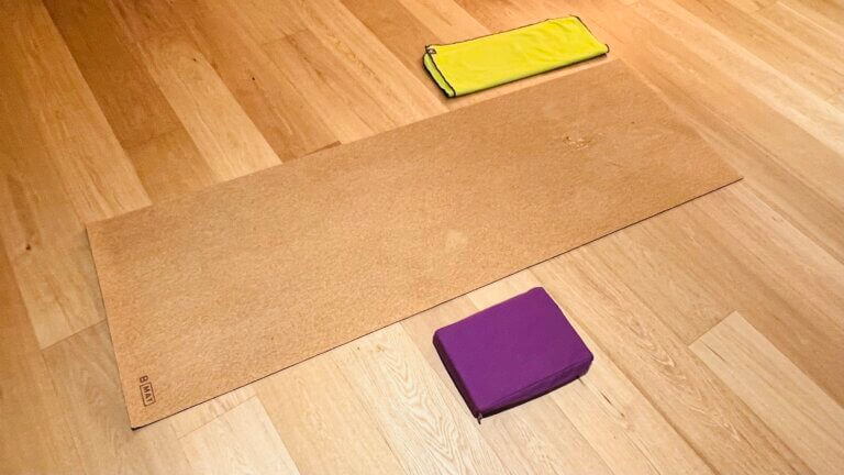 Cork mat, towel and black shown for yoga mat size chart