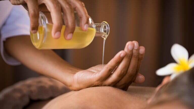 picture of a hand with ayurveda yoga oil poured into it for YACEP Training