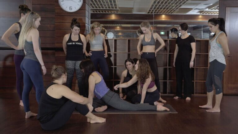 yoga teacher christina raskin, teaching YACEP advanced yoga training to students