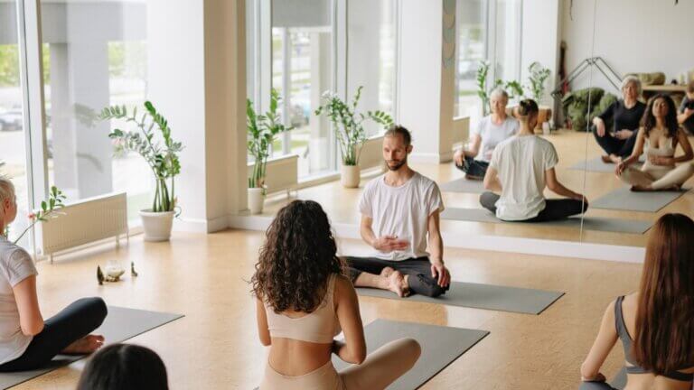 Yoga teacher reflecting on ethical teaching and professionalism