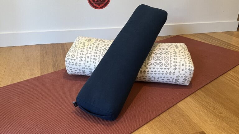 full sized yoga bolster and a narrow (prana) bolster