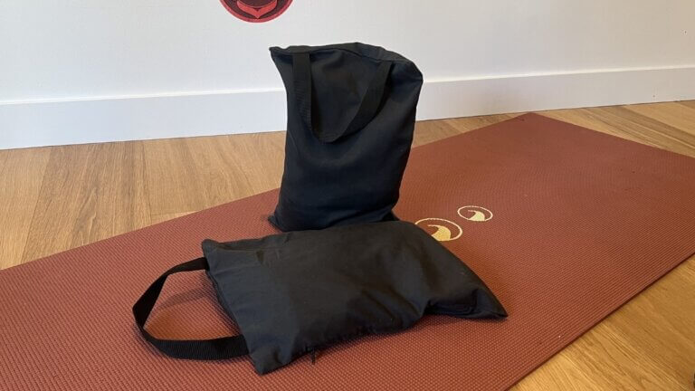 two sand bags used for yoga