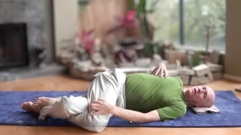 Bernie Clark doing a Yin Yoga Twisted Roots Pose