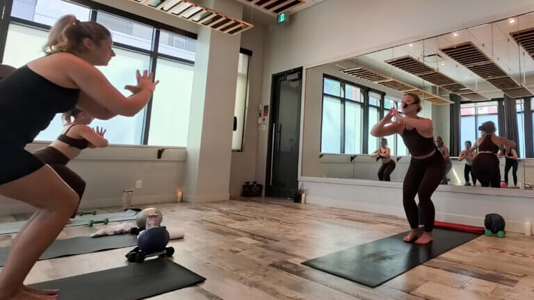 Lauren McBain leading a Yoga Sculpt training class