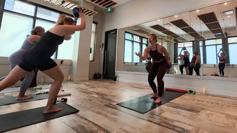 Lauren McBain leading Yoga Sculpt Teacher Training
