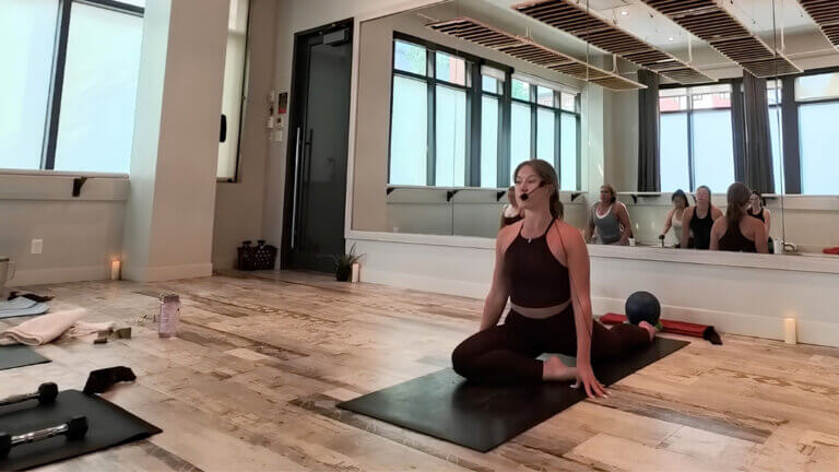 Lauren McBain teaching during Yoga Sculpt Teacher Training